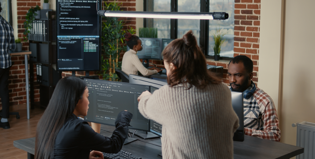 Software development team collaborating on DevOps automation